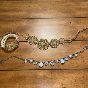 Costume jewelry:Pearl/flower bracelet, gold flower necklace, silver necklace